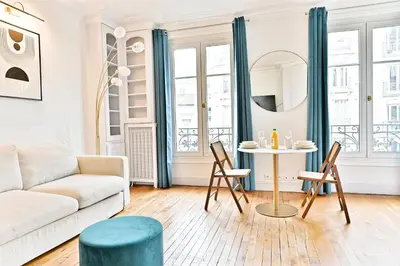 Coin salon dans l'établissement Appartement proche Gare Montparnasse - IV