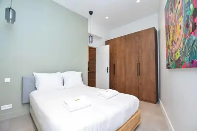 Un ou plusieurs lits dans un hébergement de l'établissement Charming Apartment -3BR/6P-Gare du Nord/Montmartre