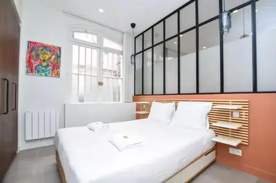 Un ou plusieurs lits dans un hébergement de l'établissement Charming Apartment -3BR/6P-Gare du Nord/Montmartre