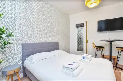 Un ou plusieurs lits dans un hébergement de l'établissement Cosy Studio 2P- Gare de l'Est/Paris Center