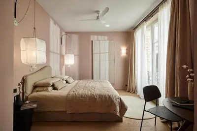 Un ou plusieurs lits dans un hébergement de l'établissement Marais - 4 pièces de 115 m2 - grand salon convivial