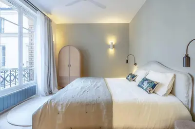 Un ou plusieurs lits dans un hébergement de l'établissement Marais - Magnificent 3BR/BTH decorated with taste