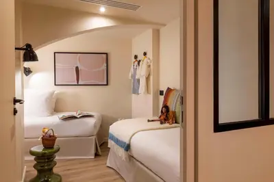 Un ou plusieurs lits dans un hébergement de l'établissement Yuna Montmartre - ApartHotel