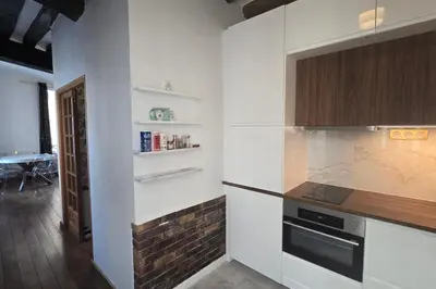 Cuisine ou kitchenette dans l'établissement Appartement Montare - Welkeys