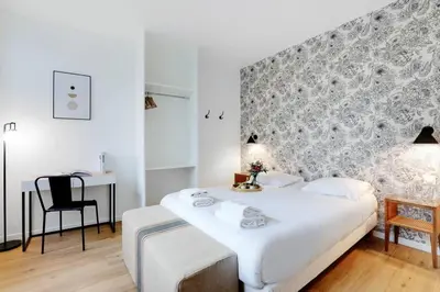 Un ou plusieurs lits dans un hébergement de l'établissement Charming Appartements for 4 people – Le Marais