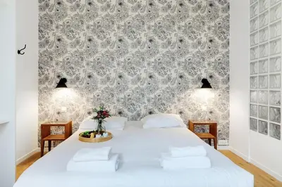 Un ou plusieurs lits dans un hébergement de l'établissement Charming Appartements for 4 people – Le Marais