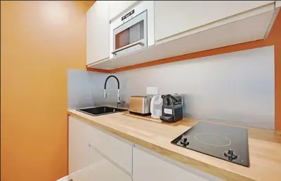 Cuisine ou kitchenette dans l'établissement Charming Appartements for 4 people – Le Marais