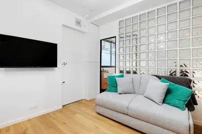 Télévision ou salle de divertissement dans l'établissement Charming Appartements for 4 people – Le Marais