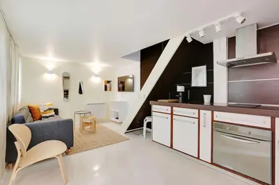 Cuisine ou kitchenette dans l'établissement Jardin plaisance