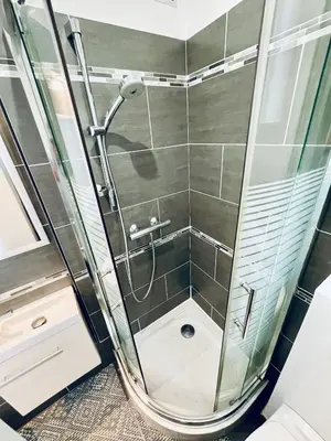 Salle de bains dans l'établissement A 10 min de La Défense et à 20 min de Paris