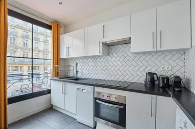 Cuisine ou kitchenette dans l'établissement Residence Centre de Paris by Studio prestige