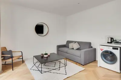 Coin salon dans l'établissement Appartement Moderne au coeur du 7ème
