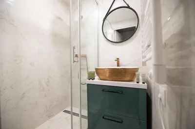 Salle de bains dans l'établissement Cosy Nest in Saint Germain