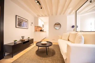 Coin salon dans l'établissement Cosy Nest in Saint Germain