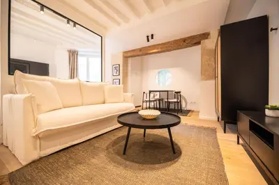 Coin salon dans l'établissement Cosy Nest in Saint Germain