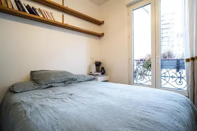 Un ou plusieurs lits dans un hébergement de l'établissement Pretty 36 m near Buttes-Chaumont