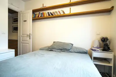Un ou plusieurs lits dans un hébergement de l'établissement Pretty 36 m near Buttes-Chaumont