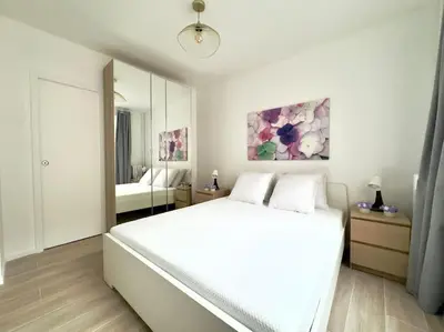 Un ou plusieurs lits dans un hébergement de l'établissement Charmant Appartement 4P Face Tour Eiffel