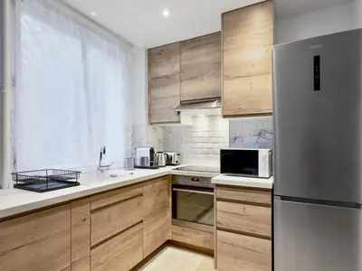 Cuisine ou kitchenette dans l'établissement Charmant Appartement 4P Face Tour Eiffel