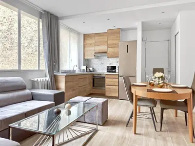 Cuisine ou kitchenette dans l'établissement Charmant Appartement 4P Face Tour Eiffel