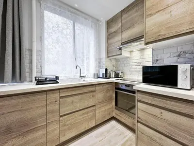 Cuisine ou kitchenette dans l'établissement Charmant Appartement 4P Face Tour Eiffel