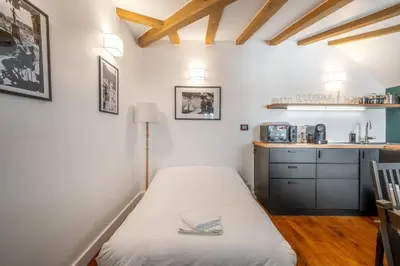 Un ou plusieurs lits dans un hébergement de l'établissement My Little House in Paris * Hypercentre * Climatisé