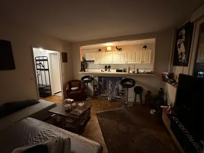 Cuisine ou kitchenette dans l'établissement Appartement Paris La Défense Metro L1/RER A