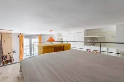 Un ou plusieurs lits dans un hébergement de l'établissement Géranimus CLERY: Heart of Paris