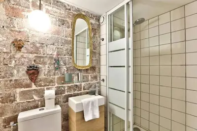 Salle de bains dans l'établissement Geranimus St Paul Coeur de paris