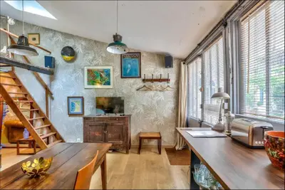 Télévision ou salle de divertissement dans l'établissement Geranimus St Paul Coeur de paris