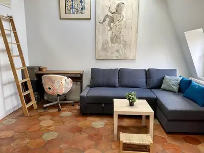 Coin salon dans l'établissement Grand Studio d’architecte proche Montmartre