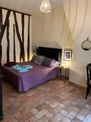 Un ou plusieurs lits dans un hébergement de l'établissement Appartement dans le Marais 3 chambres