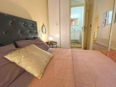 Un ou plusieurs lits dans un hébergement de l'établissement Appartement dans le Marais 3 chambres