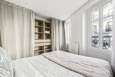 Un ou plusieurs lits dans un hébergement de l'établissement Luxury apartment near Le Marais