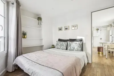 Un ou plusieurs lits dans un hébergement de l'établissement Luxury apartment near Le Marais