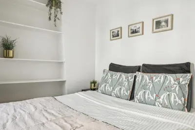 Un ou plusieurs lits dans un hébergement de l'établissement Luxury apartment near Le Marais