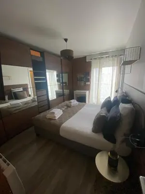 Un ou plusieurs lits dans un hébergement de l'établissement Appartement familial 140 m2 Paris 13