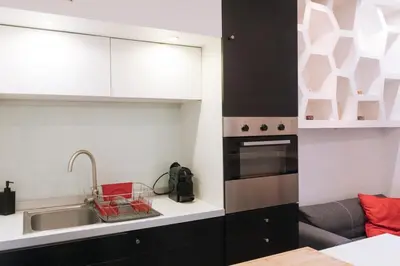 Cuisine ou kitchenette dans l'établissement Cosy & Stylish Large Studio VoltaireOberkampf!