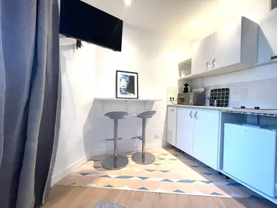 Cuisine ou kitchenette dans l'établissement Dans le triangle d’Or de Boulogne