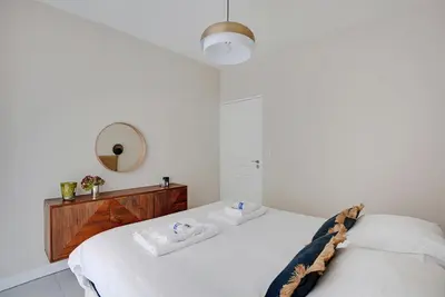 Un ou plusieurs lits dans un hébergement de l'établissement Modern Apartment -Accor Arena Bercy 1BR-4P