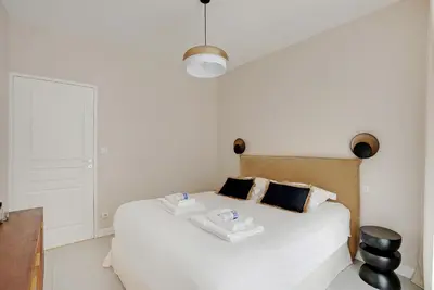 Un ou plusieurs lits dans un hébergement de l'établissement Modern Apartment -Accor Arena Bercy 1BR-4P