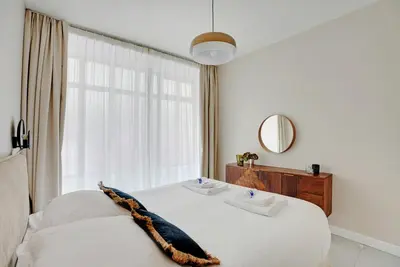 Un ou plusieurs lits dans un hébergement de l'établissement Modern Apartment -Accor Arena Bercy 1BR-4P