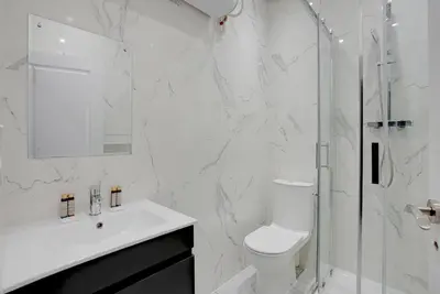 Salle de bains dans l'établissement Modern Apartment -Accor Arena Bercy 1BR-4P
