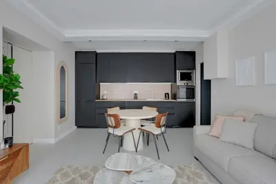 Cuisine ou kitchenette dans l'établissement Modern Apartment -Accor Arena Bercy 1BR-4P