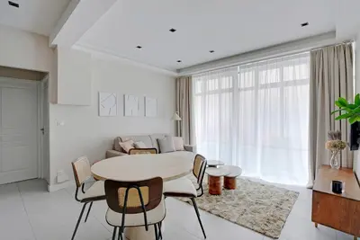Coin salon dans l'établissement Modern Apartment -Accor Arena Bercy 1BR-4P