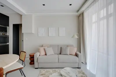 Coin salon dans l'établissement Modern Apartment -Accor Arena Bercy 1BR-4P