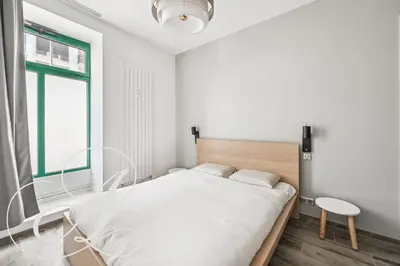 Un ou plusieurs lits dans un hébergement de l'établissement Oasis, superbe appart 3 chambres à Paris 15ème