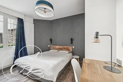 Un ou plusieurs lits dans un hébergement de l'établissement Oasis, superbe appart 3 chambres à Paris 15ème