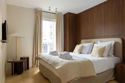 Un ou plusieurs lits dans un hébergement de l'établissement Spacious apartment - 3BR-8P - Eiffel Tower