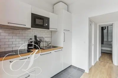 Cuisine ou kitchenette dans l'établissement Milord, F3 à Père Lachaise